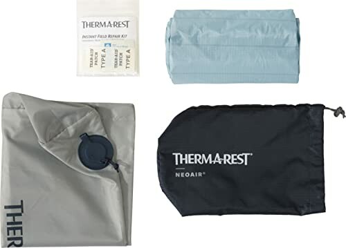 Therm-a-Rest NeoAir sleeping mat with repair kit and carrying bag.